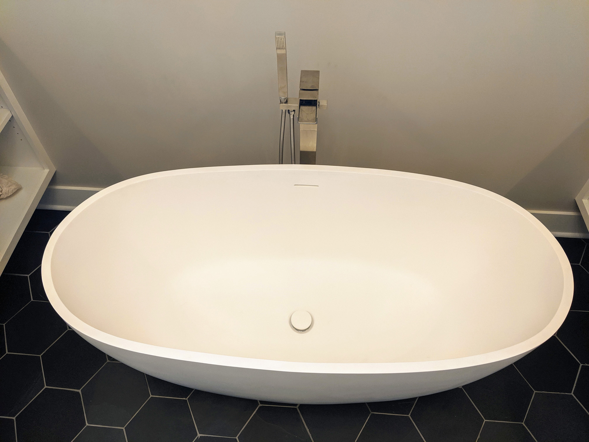 Floor mounted tub fixture