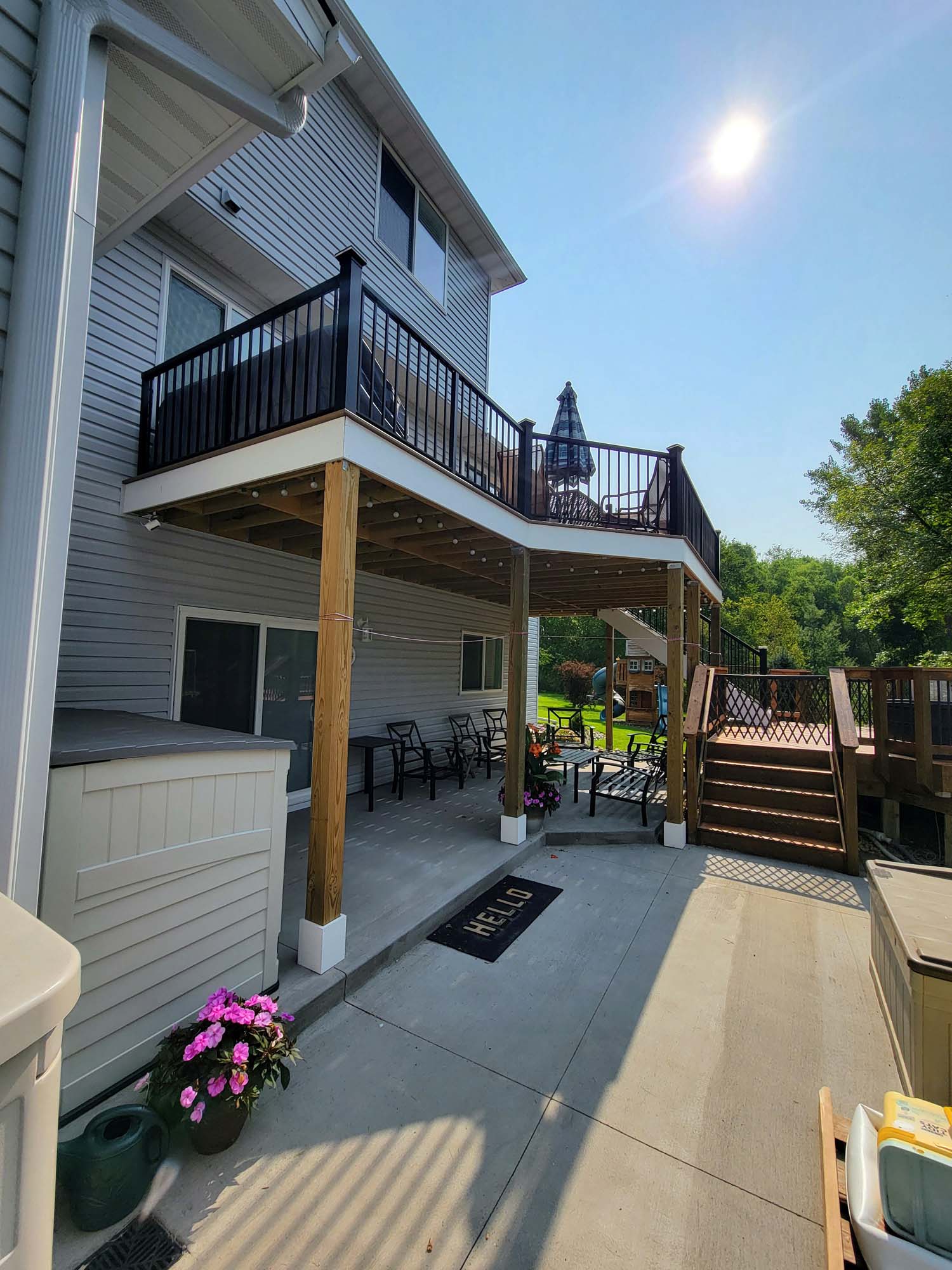 New deck with stairs to patio