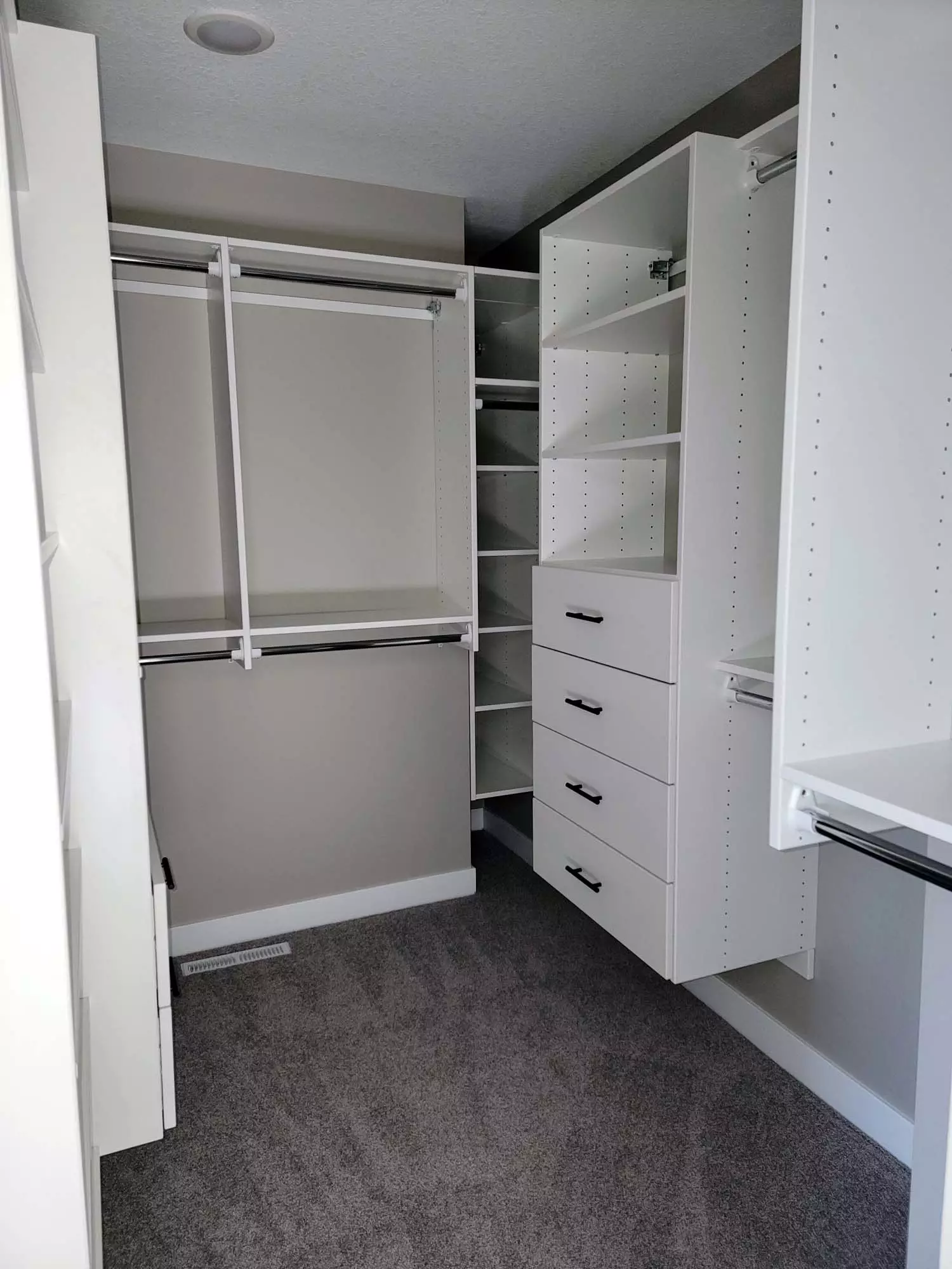 Large walk-in closet with built-in organizers