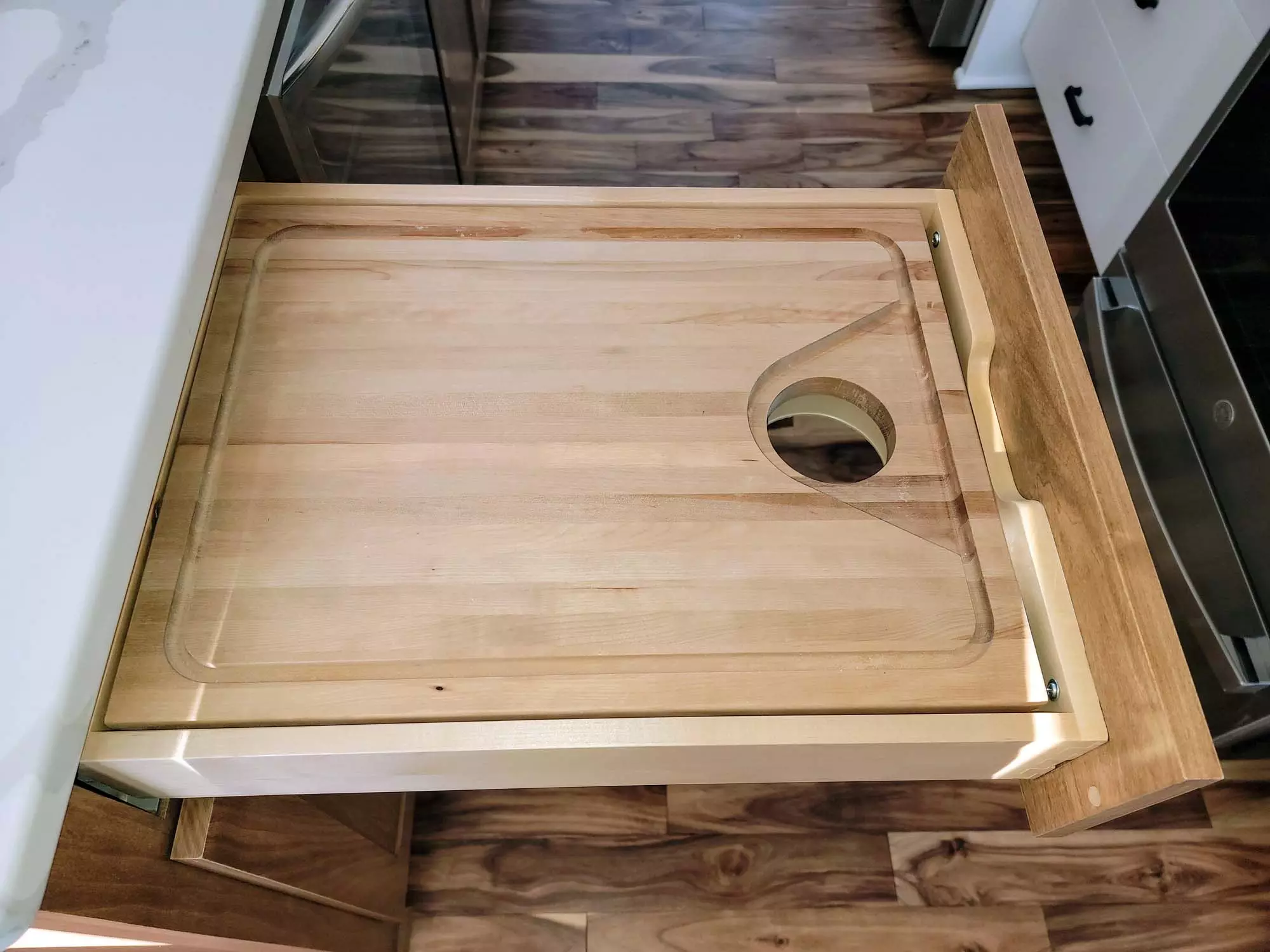 Custom Cutting board drawer with hole to trash below