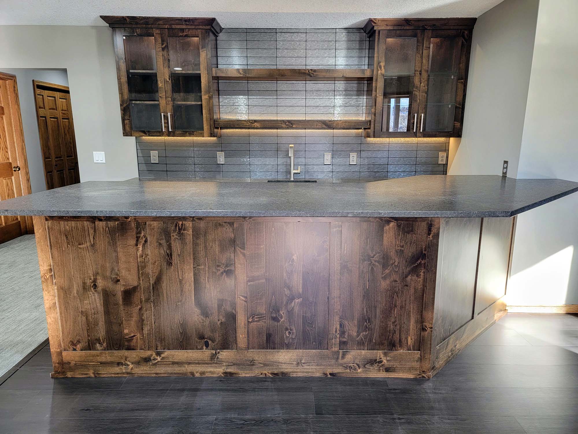 Wet bar with Custom Rustic “Knotty” Alder Cabinets
