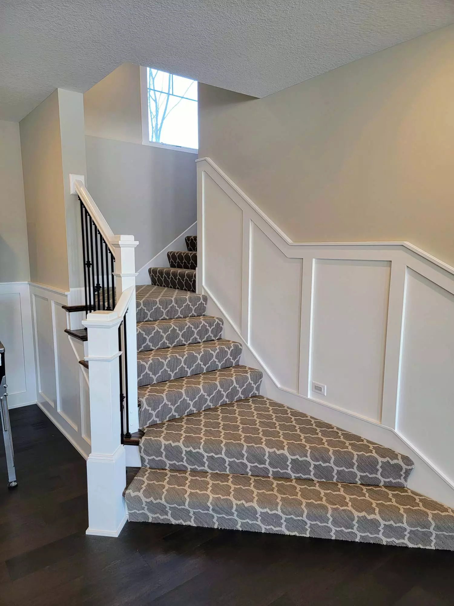 Zigzag staircase with Wainscoting