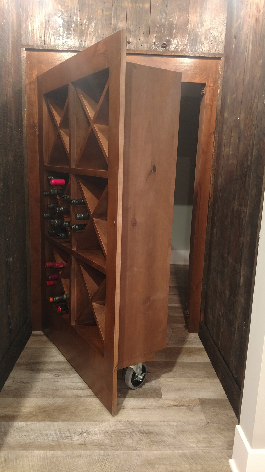 Hidden wine box door to under stair storage