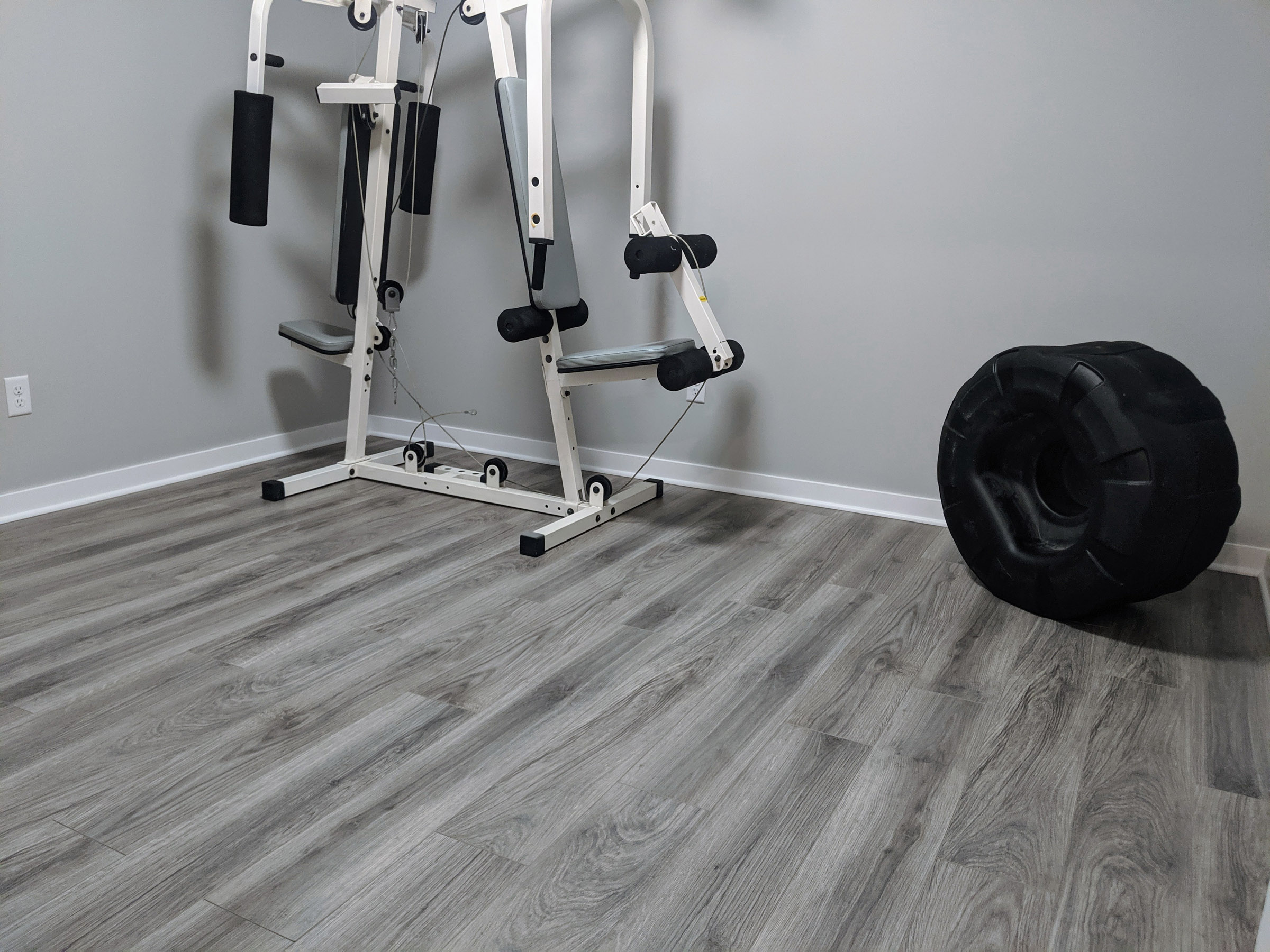 Exercise room has LVP (Luxury Vinyl Plank) flooring