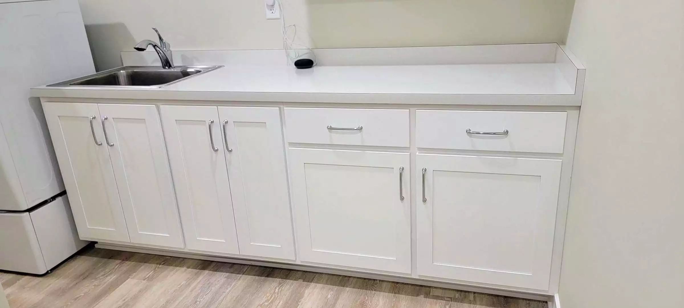 The perfect Laundry room w/ Custom cabinets