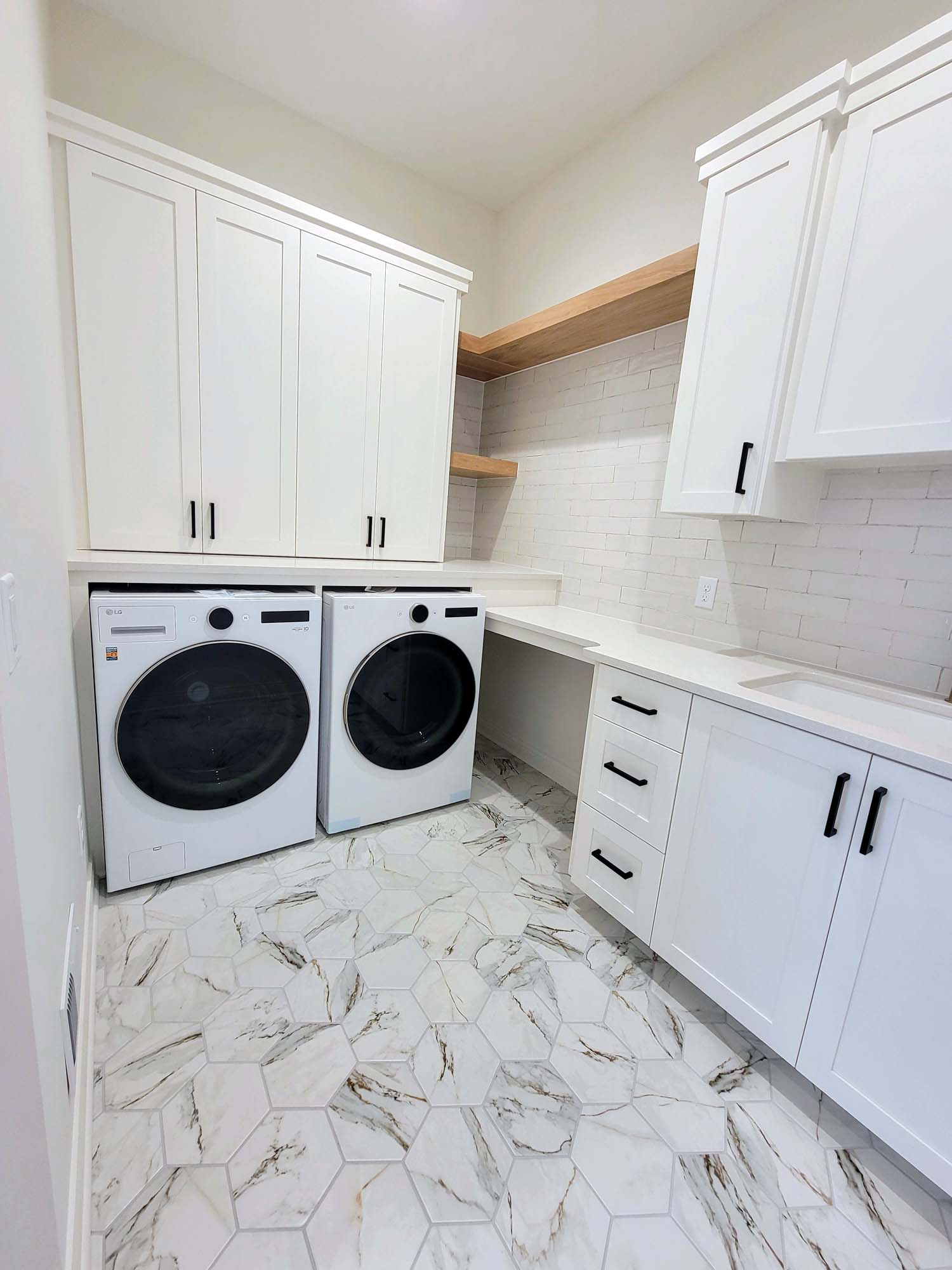 Laundry room with lots of cabinet and counter space