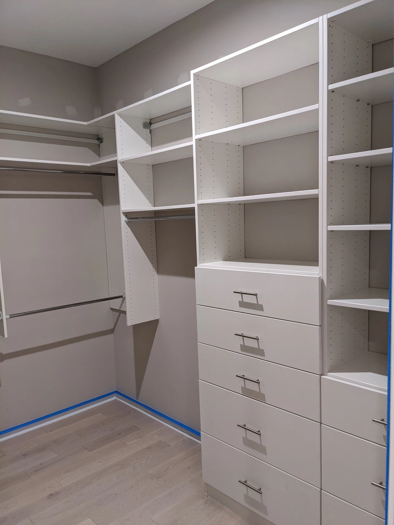 Massive Walk-in-Closet w/ floor to ceiling custom shelving