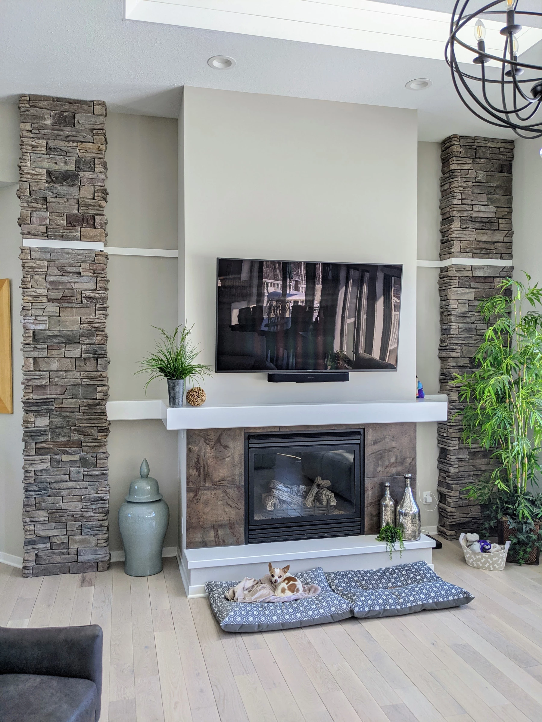 Media Wall with Fireplace and Stone Columns